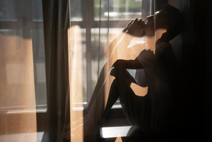creative-portrait-man-with-curtains-shadows-from-window_23-2149657491